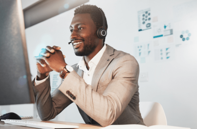Young man having sales conversation over Zoom and feeling confident thanks to a DiSC personality assessment