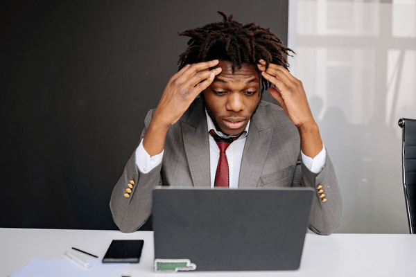 Frustrated founder sitting at his computer